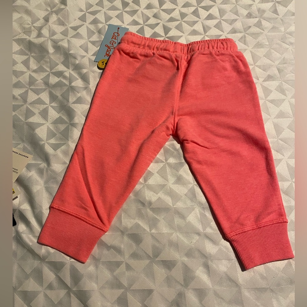 I/ Cat Es Jack pants of girl color  pink new seiz 12m